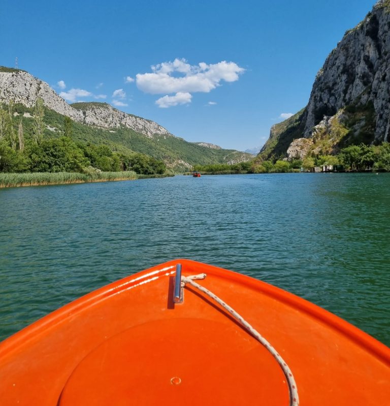 Orange Dinghy Rides Up A Green Cetina Canyon